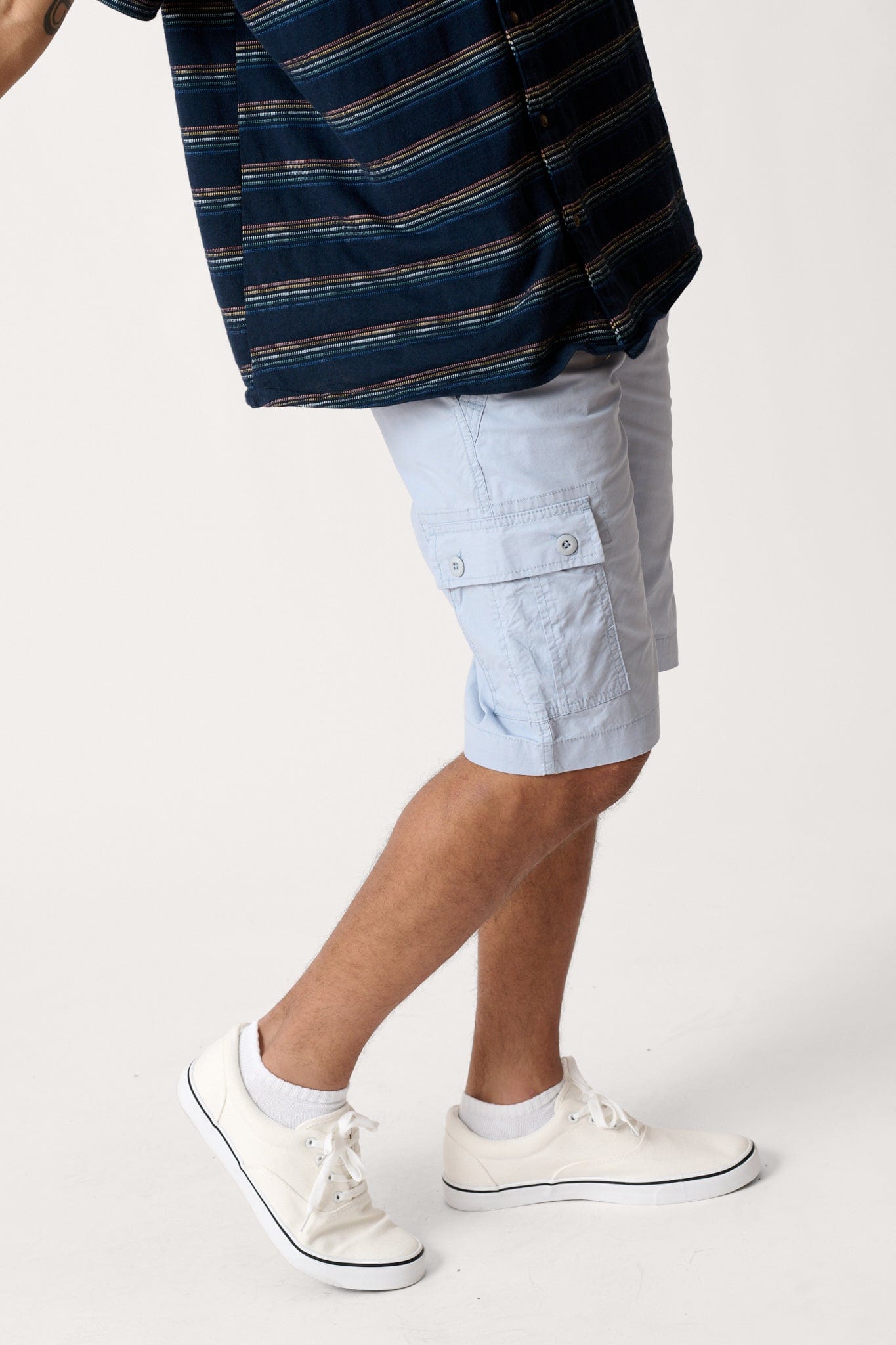 Male model dressed in men’s hiking shorts with the WEARFIRST Poplin Day Hiker in BLEACHED  BLUE.