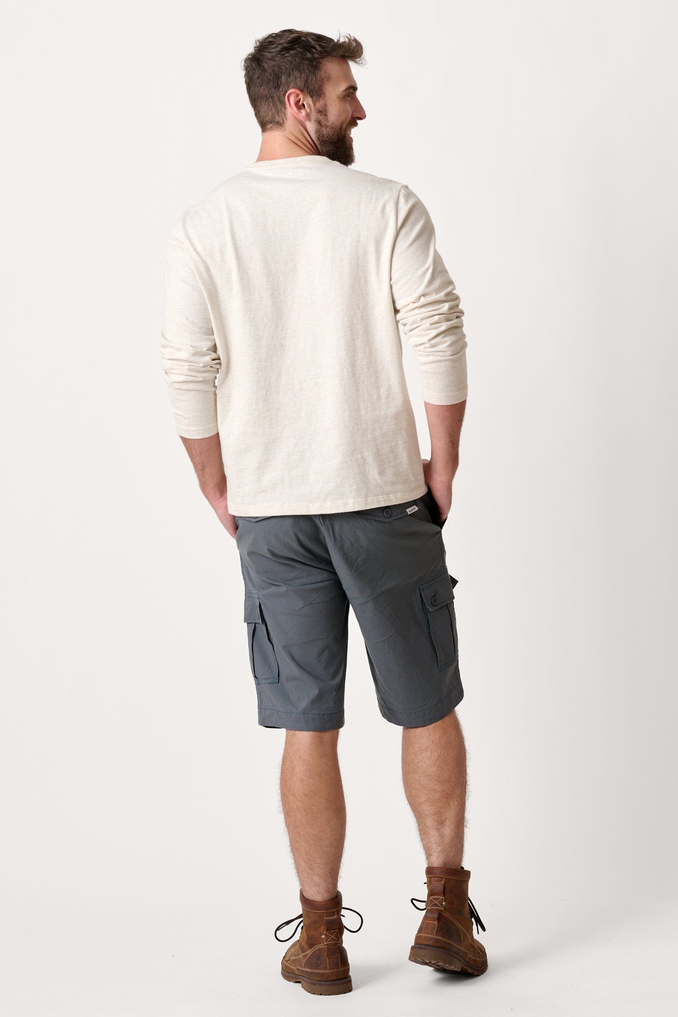 Male model dressed with the WEARFIRST Rambler Day Hiker Cargo Short in Turbulence