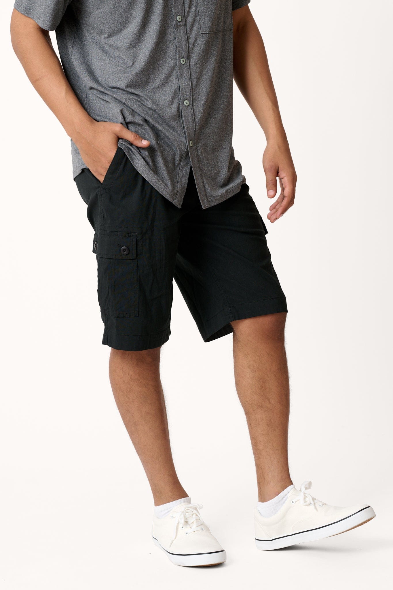 Male model casually dressed in hiking shorts with the WEARFIRST Canyon Day Hiker in Tap Shoe