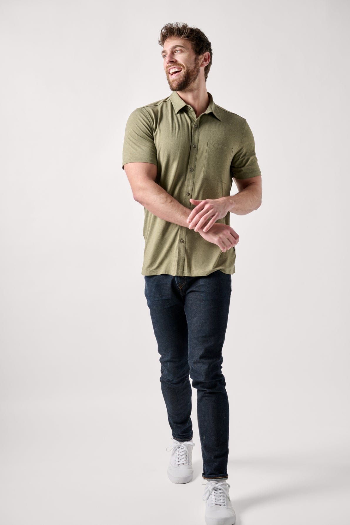Male dressed in casual style with the  All Day Performance Shirt in Four Leaf Clover Heather