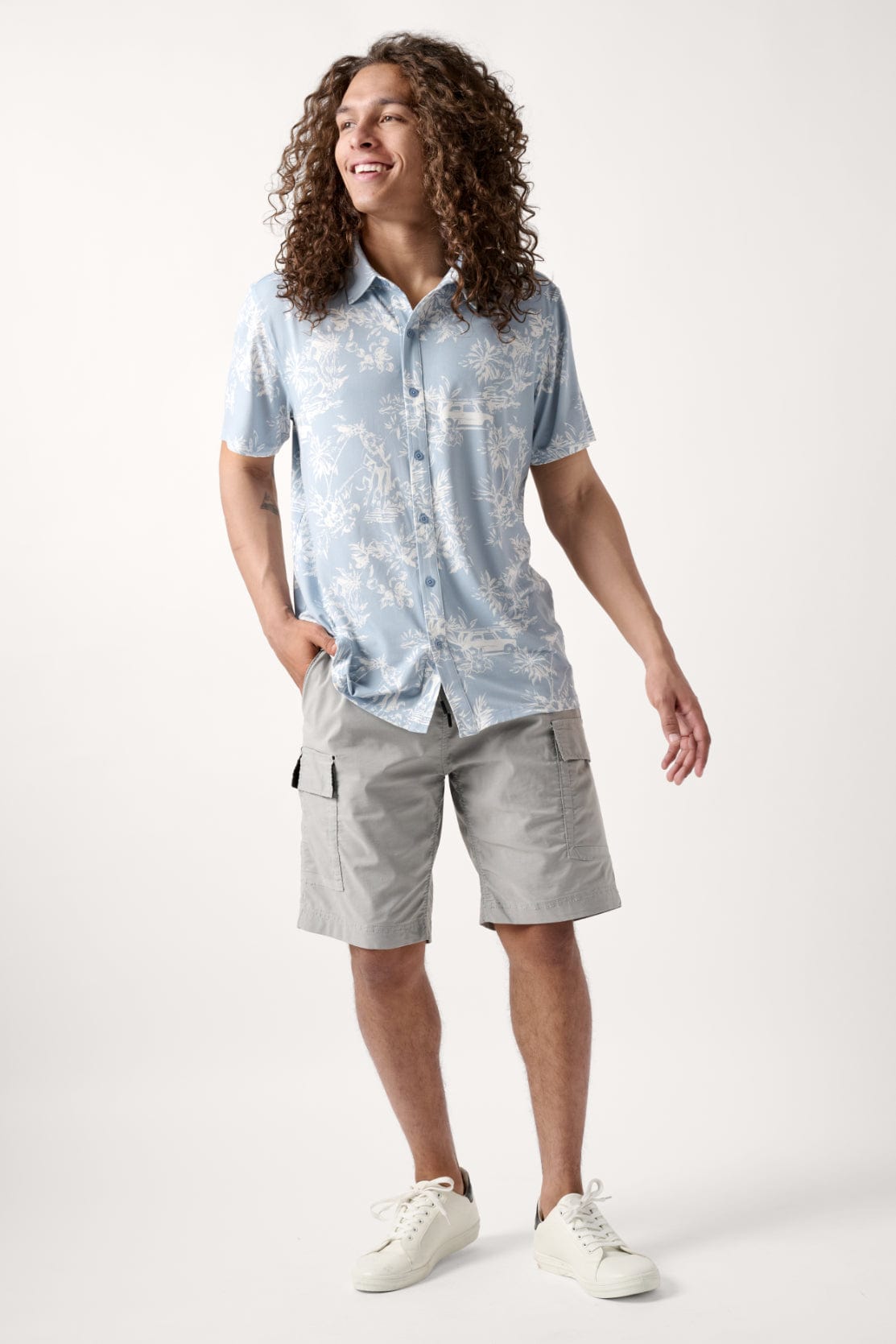 Male model dressed in men’s fitted shirt with the WEARFIRST Wanderer Shirt in Blue Fog Vintage Hula