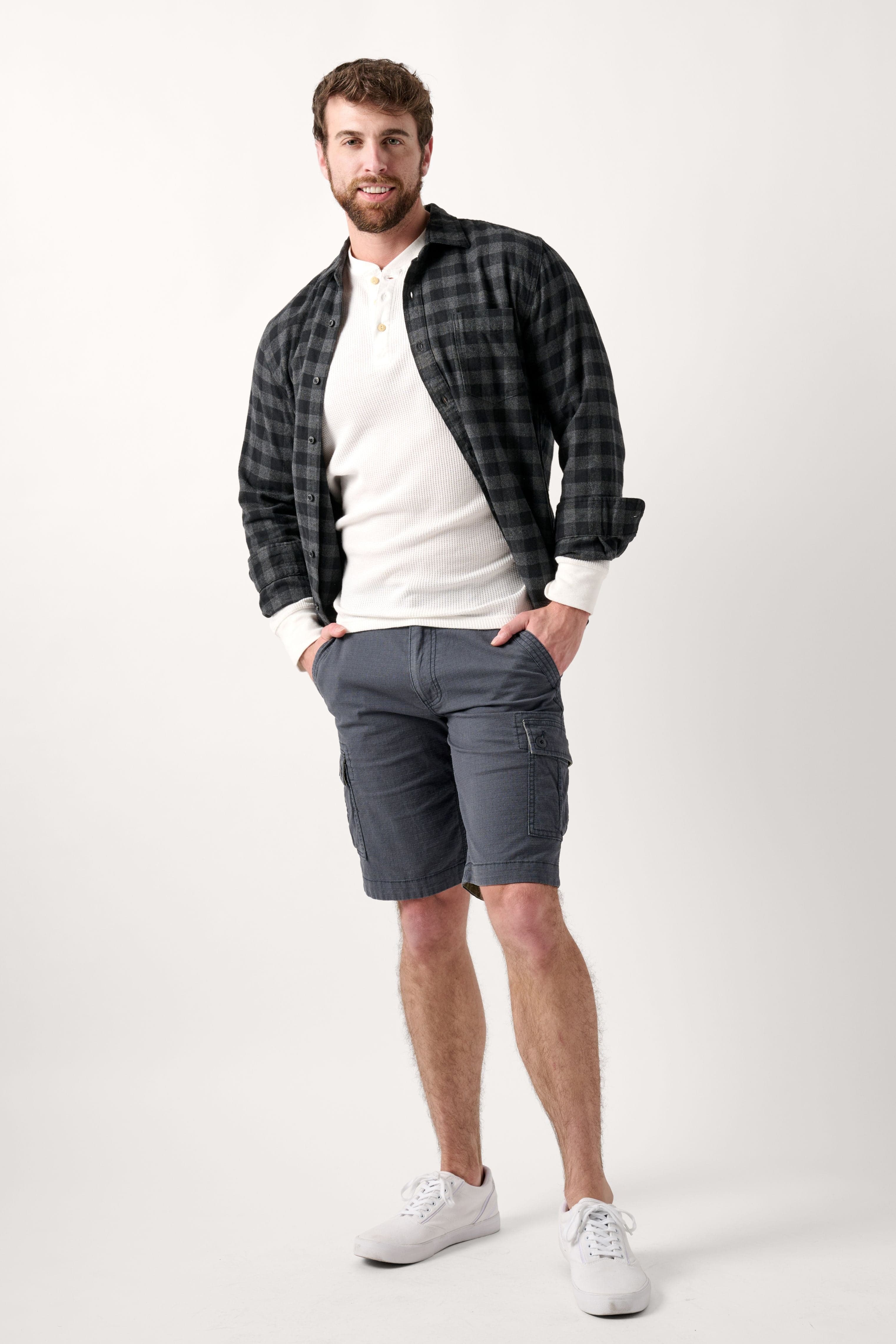 Male model dressed in WEARFIRST Caution Ripstop Day Hiker Cargo Short in India Ink