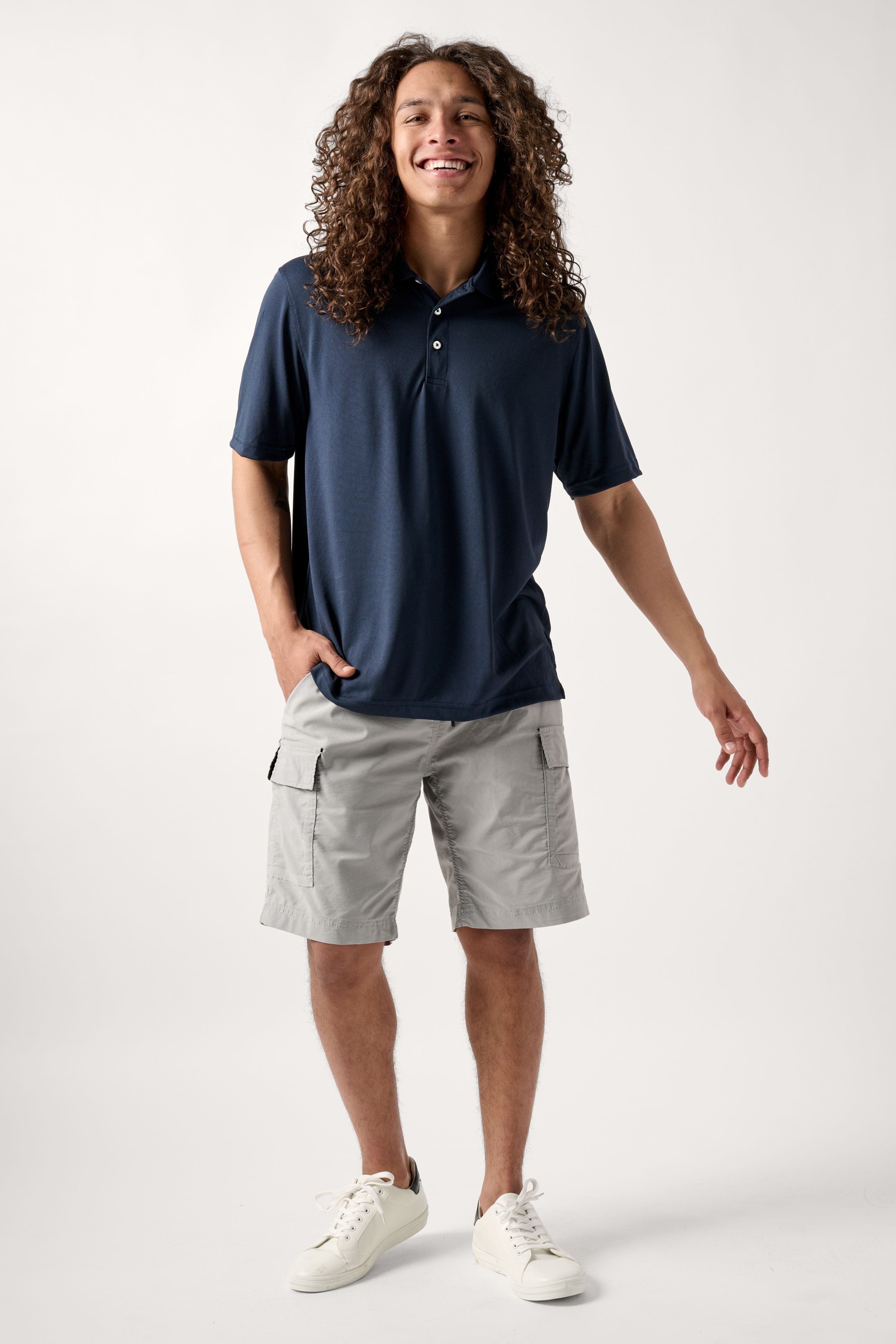 Male model dressed in the WEARFIRST Pacer Cargo Short with a drawstring in Ultimate Gray