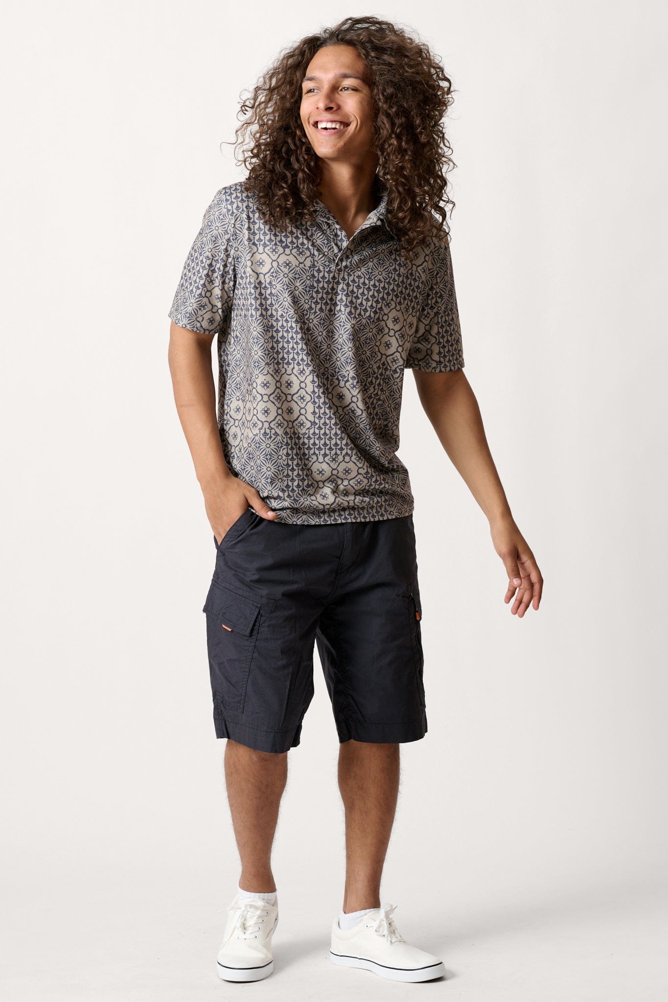 Male model dressed in casual men’s style with the WEARFIRST Roam Short in Blue Graphite