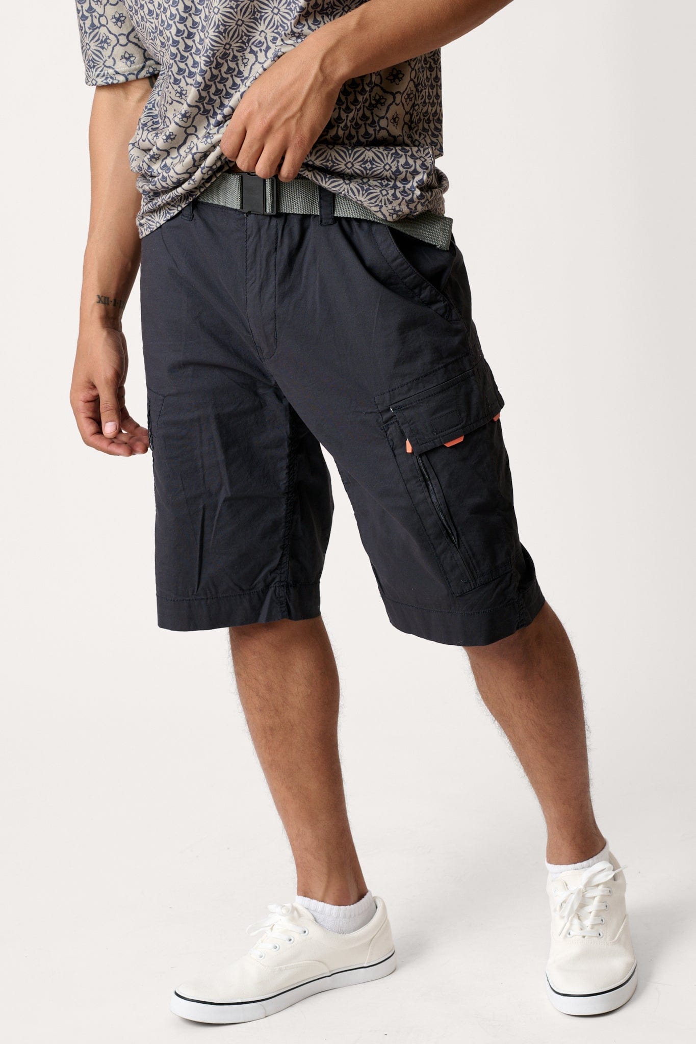 Male model dressed in casual men’s style with the WEARFIRST Roam Short in Blue Graphite