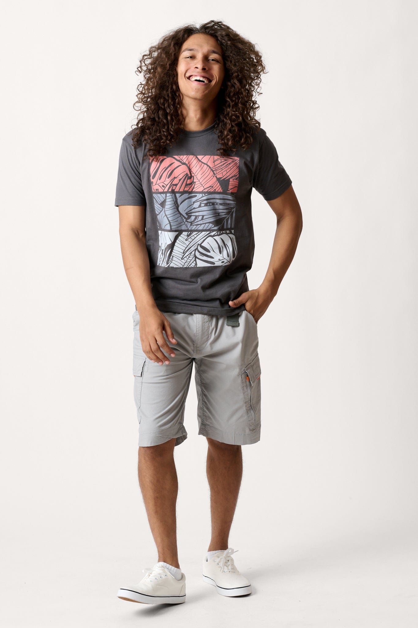 Male model dressed in casual men’s style with the WEARFIRST Roam Short in Ultimate Gray