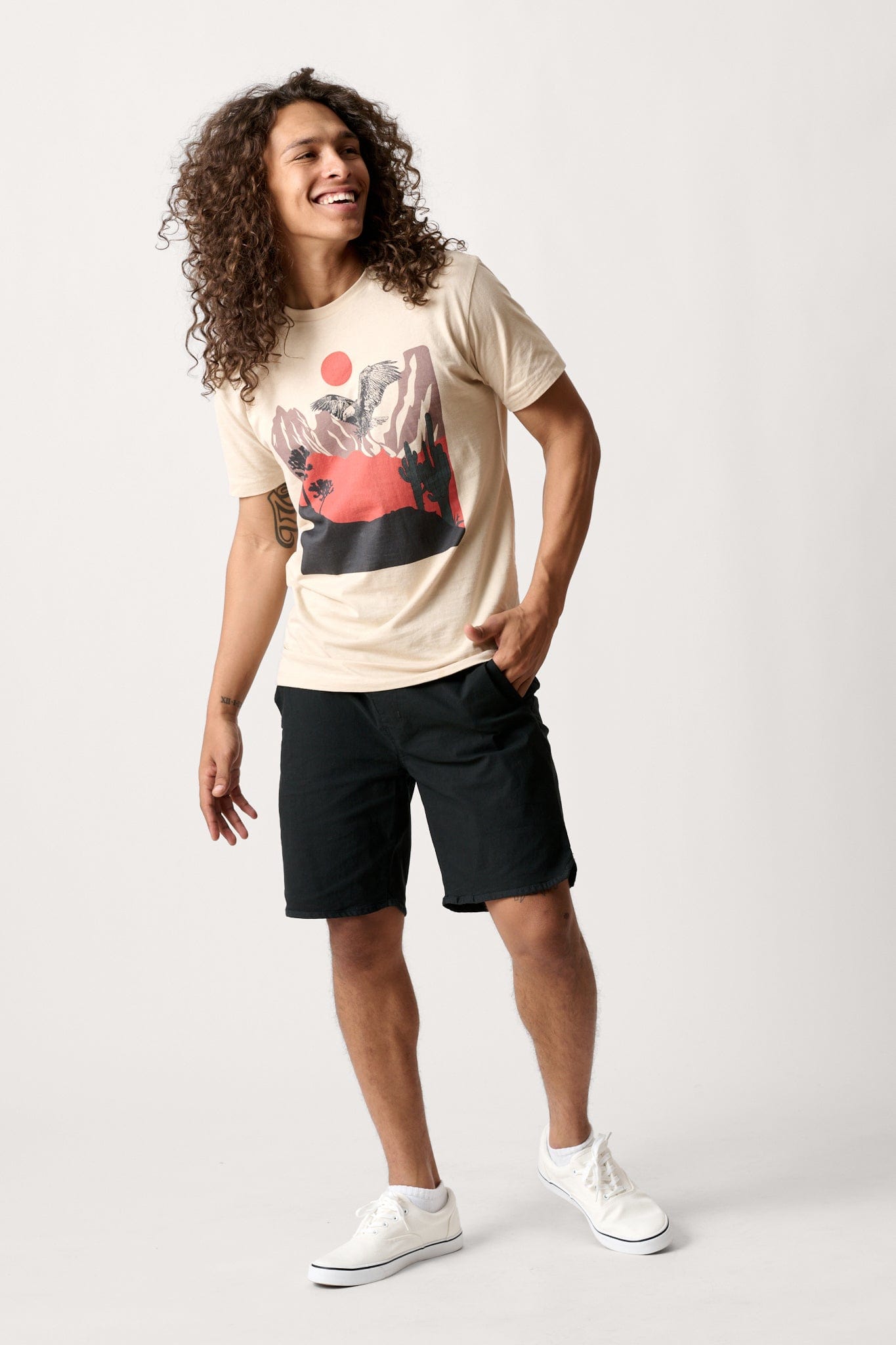Male model dressed in men’s lightweight shorts with the WEARFIRST Volley Short in Tap Shoe Black 