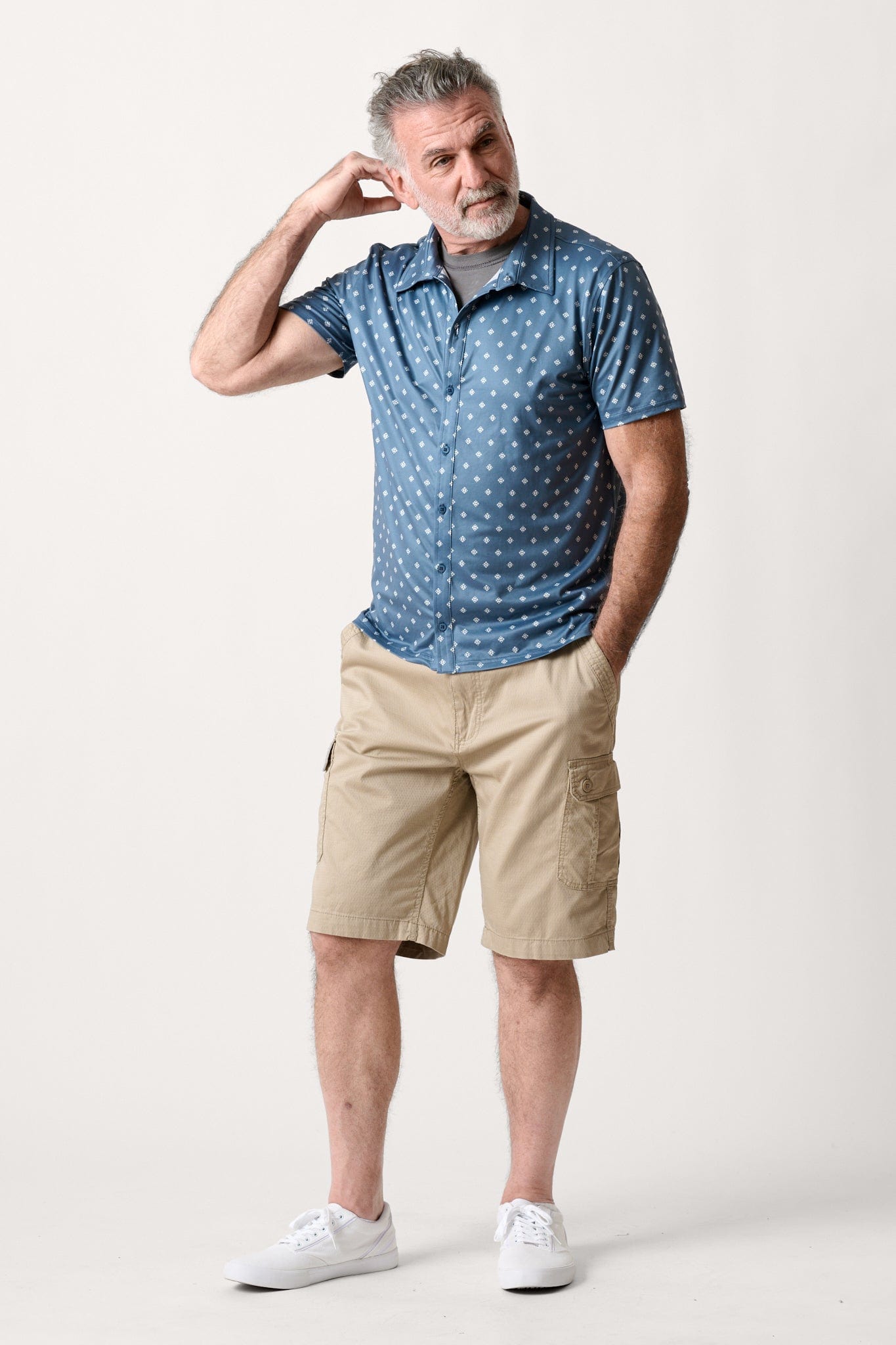 Male model dressed in casual men’s style with the WEARFIRST Stretch Texture Short in Chinchilla