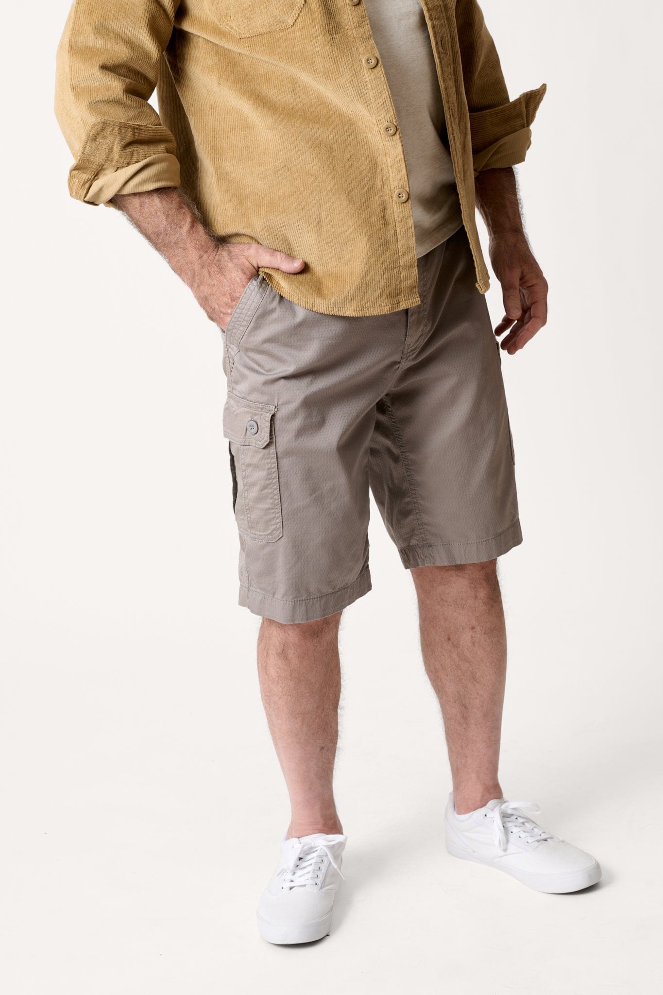 Male model dressed in casual men’s style with the WEARFIRST Stretch Texture Short in Cloudburst
